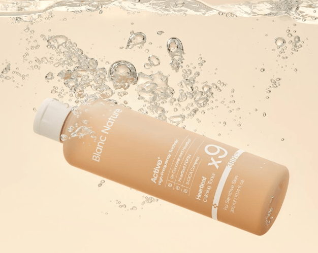 The large bottle of Blanc Nature Heartleaf Toner on a clinical vanity